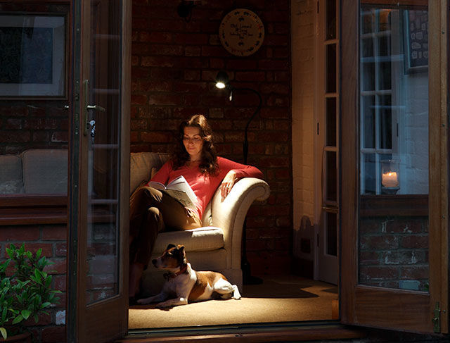Woman reading with HD floor light