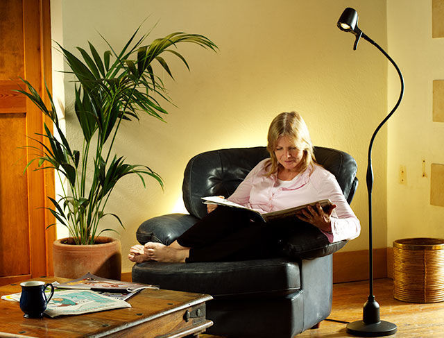 Woman reading with HD Floor Light
