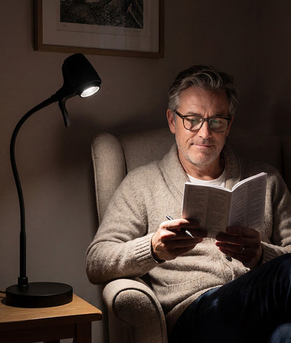 Man reading with HD Pro table light