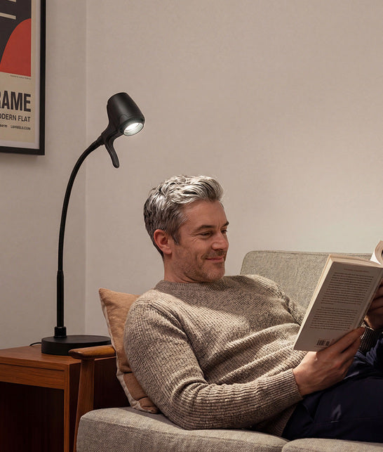 Man reading with HD Pro table light