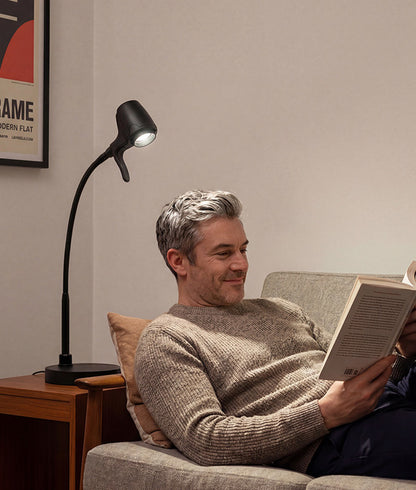 Man reading with HD Pro table light