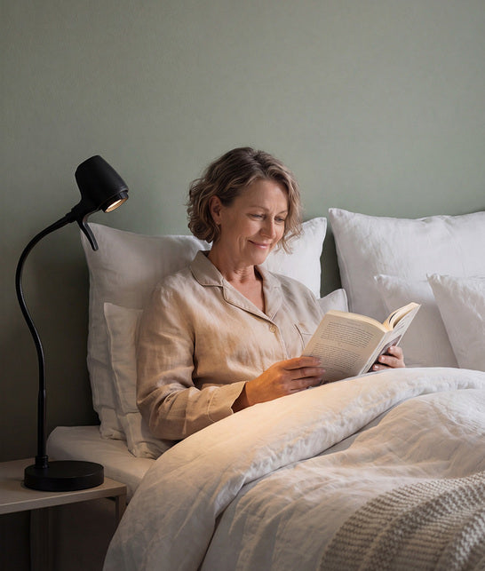 Woman reading with HD Pro table light