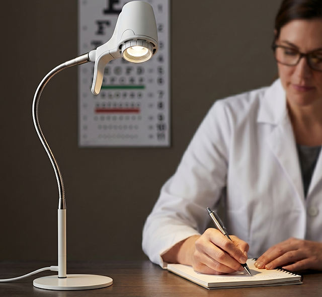 Optician reading with HD Original table light