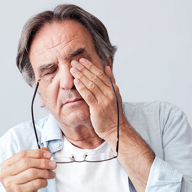 Man with eyestrain
