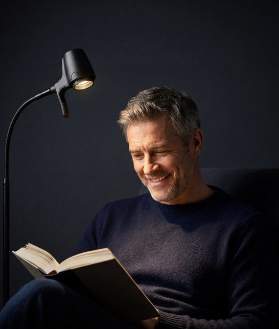 Man reading with HD floor light