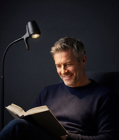 Man reading with HD floor light