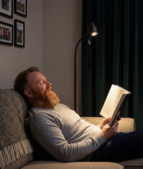 Man reading with HD floor light