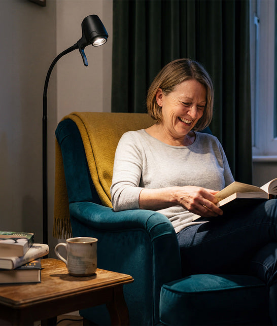 Woman reading with HD floor light