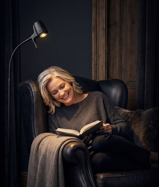 Woman reading with HD floor light