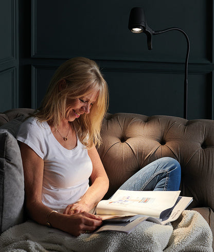 Woman reading with HD floor light